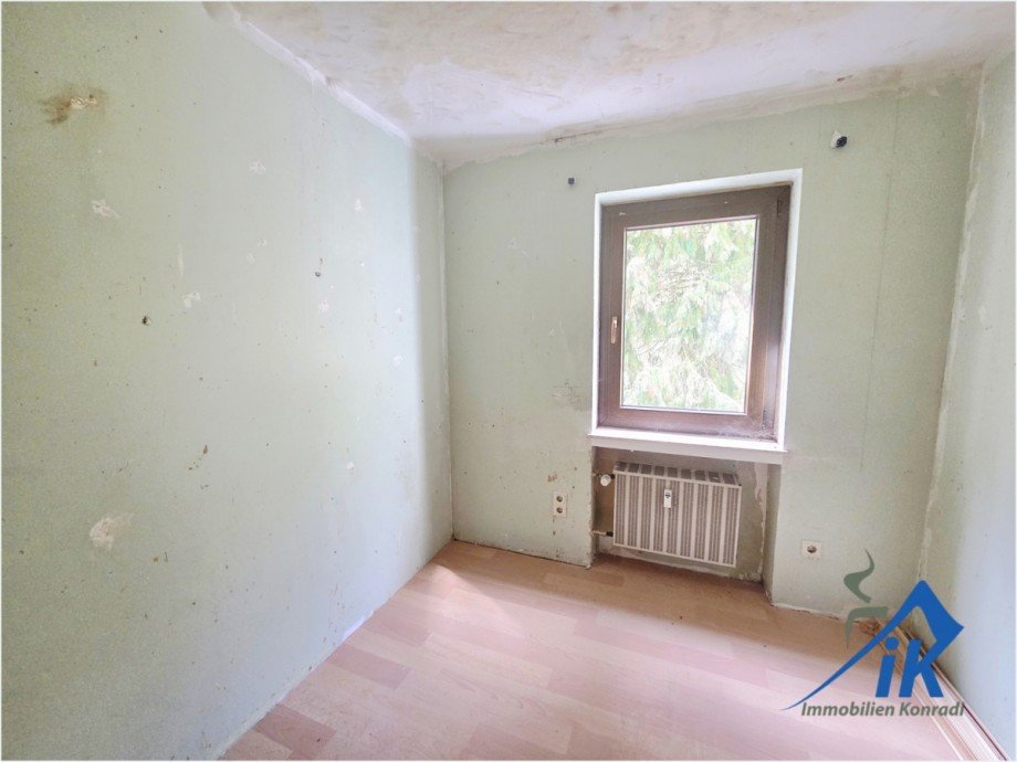 Schlafzimmer OG Mehrfamilienhaus Sankt Julian