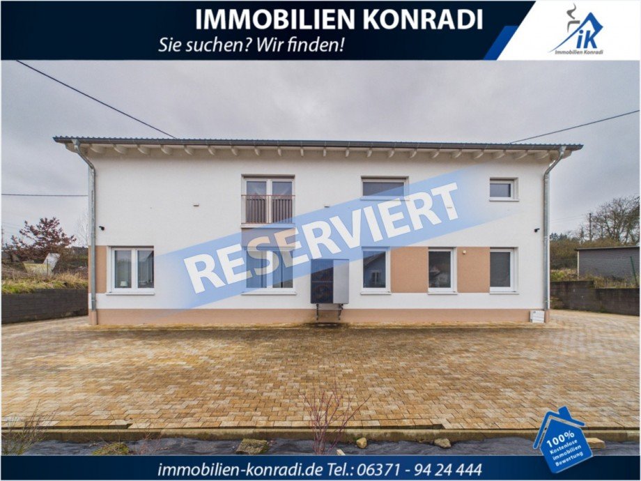 Stra�enansicht Zweifamilienhaus Sch�nenberg
