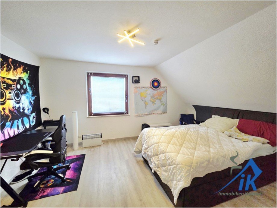 Schlafzimmer OG Mehrfamilienhaus Sankt Julian